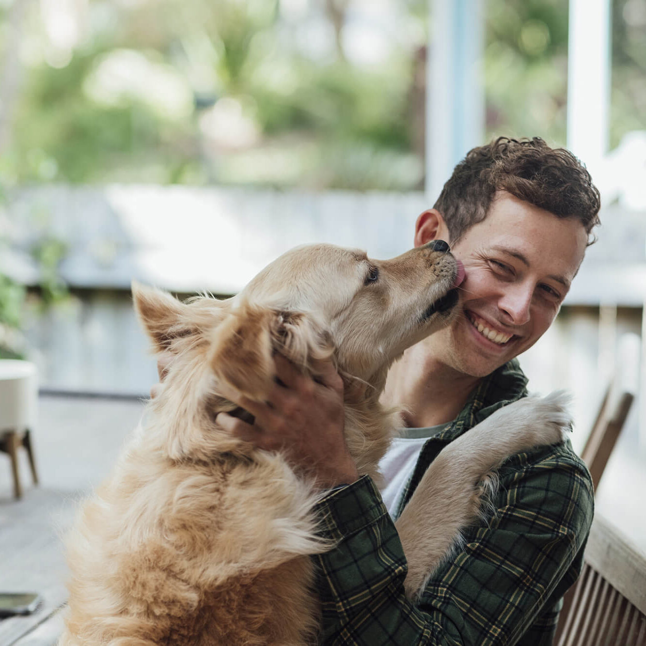 Dog Licking Mans Face